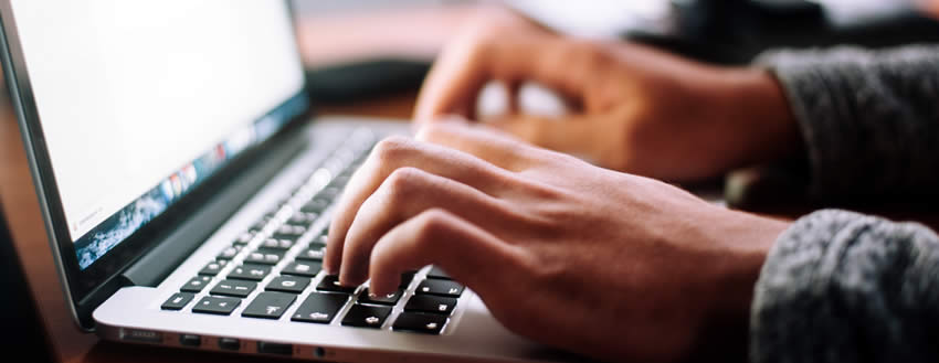 Updating personal details on a form on a laptop