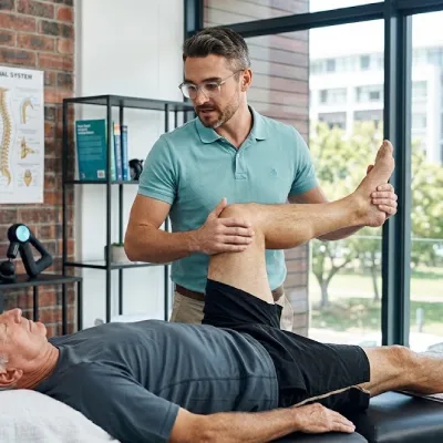 Physiotherapist with patient